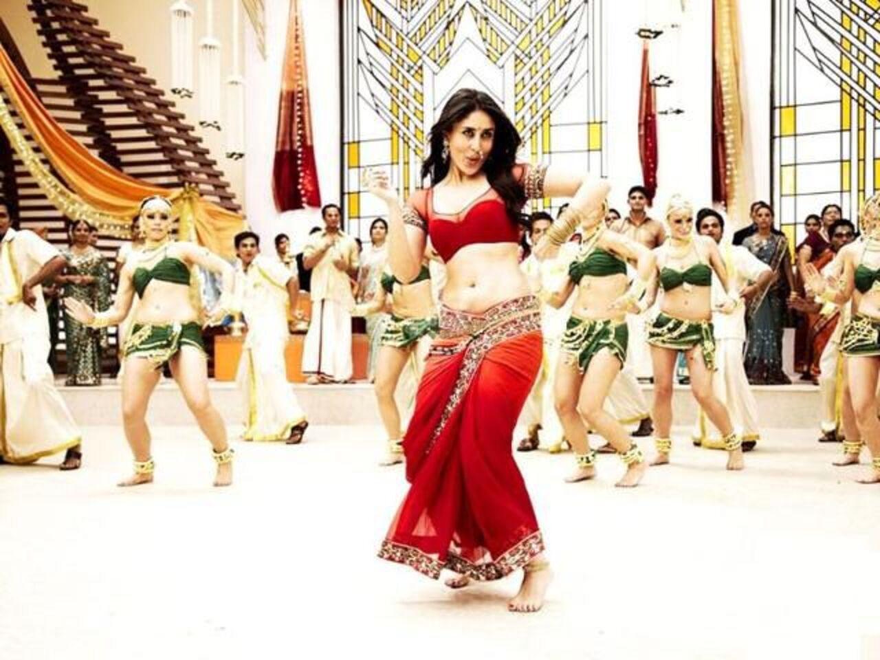 Kareena Kapoor’s red saree in Ra.One became an instant style sensation. It was bold, vibrant, and striking. The modern experiment landed well. It ditched the pallu while still maintaining the grace of a drape.